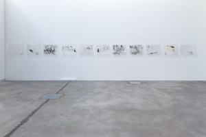 and graffiti, captured from Berlin’s subway and bus shelters, revealing hidden histories and tensions in urban spaces,.