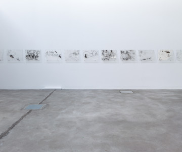 and graffiti, captured from Berlin’s subway and bus shelters, revealing hidden histories and tensions in urban spaces. Nadia Kaabi-Linke, Berlin à fleur de peau.
