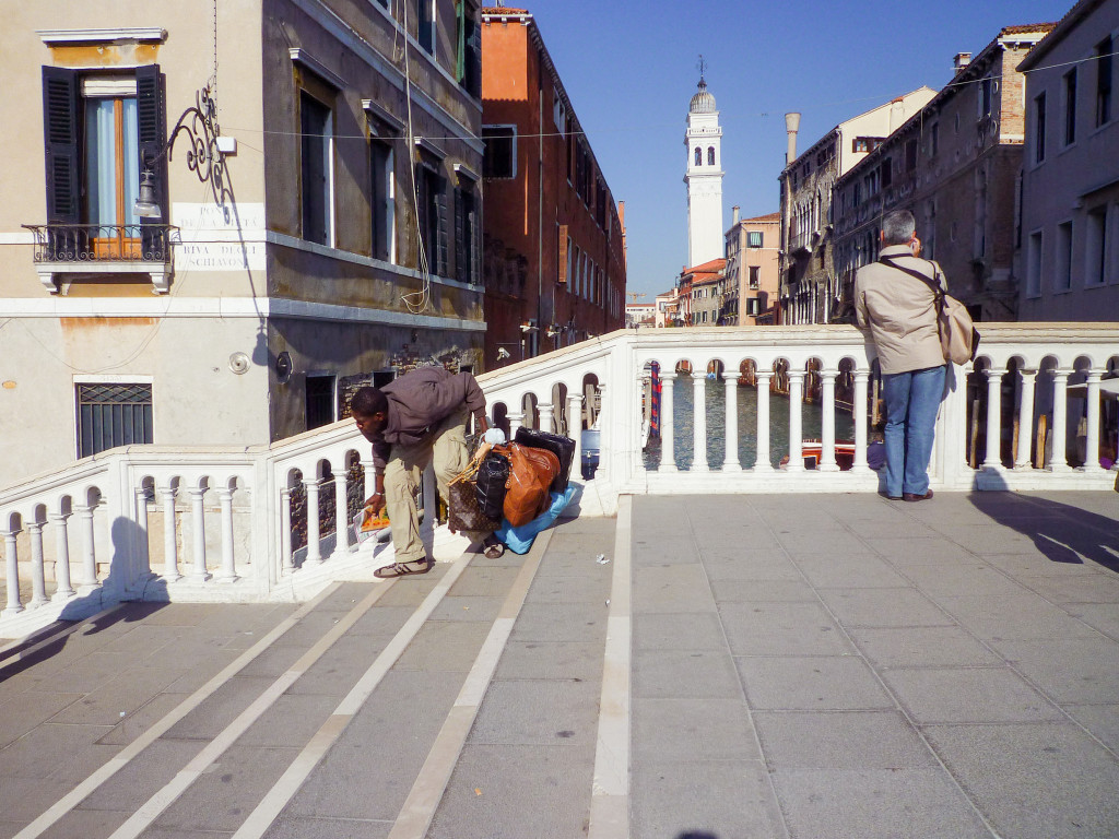Flying Carpets, 2011, Photographs from the Ponte del Sepolcro Diary. Day 2: October 24, fig 2: Day 5: October 28, 2010. Alfa, Ali and me on the bridge del Sepolcro. 2010. Djibi getting his bags to get away, Nadia Kaabi-Linke