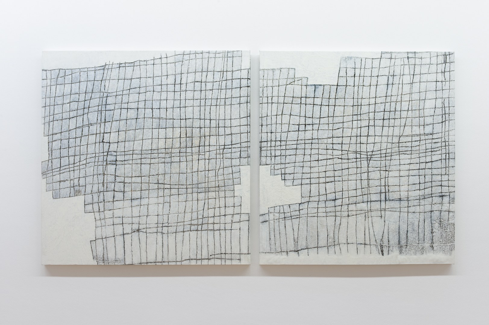 Transfer prints of a hand-drawn grid on canvas