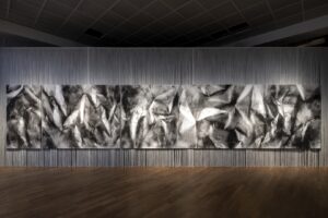 Exhibition view of a painting made with coal grains, Kula:Cuts, Hamburger Bahnhof, Berlin, 2023, Nadia Kaabi-Linke