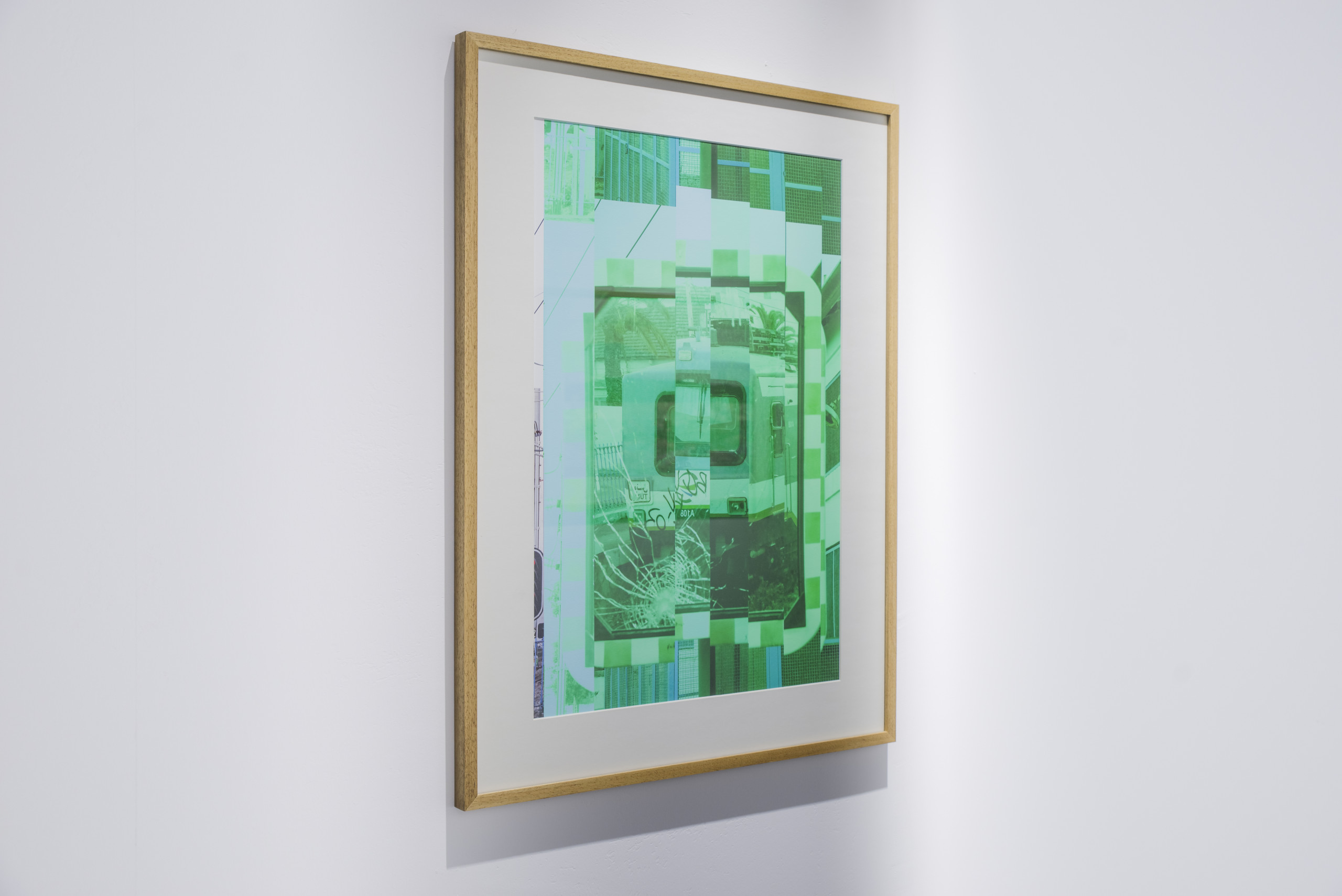 Framed photograph on a wall.