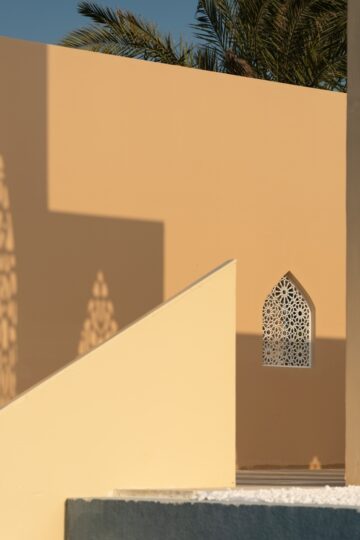 A public art installation working with the theme of the changing shadow as a universal connecting power. Gothic is a signature of Occidental buildings; Islamic geometry is the ratio of Oriental architecture. Nadia Kaabi-Linke Bait Al Nur / بيت النور