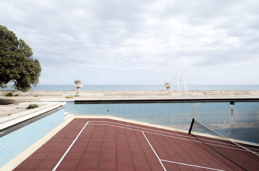 A tennis court was built on the ground of an uneven pool by the sea. Nadia Kaabi-Linke ONS