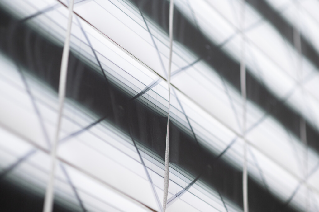 Close up of an artwork, pictures with a slightly changing black and white image aligned close to each other ( Close Up) / Squeezed in Infinity II (Detail view), NAMU_Kyiv, 2023 Nadia Kaabi-Linke