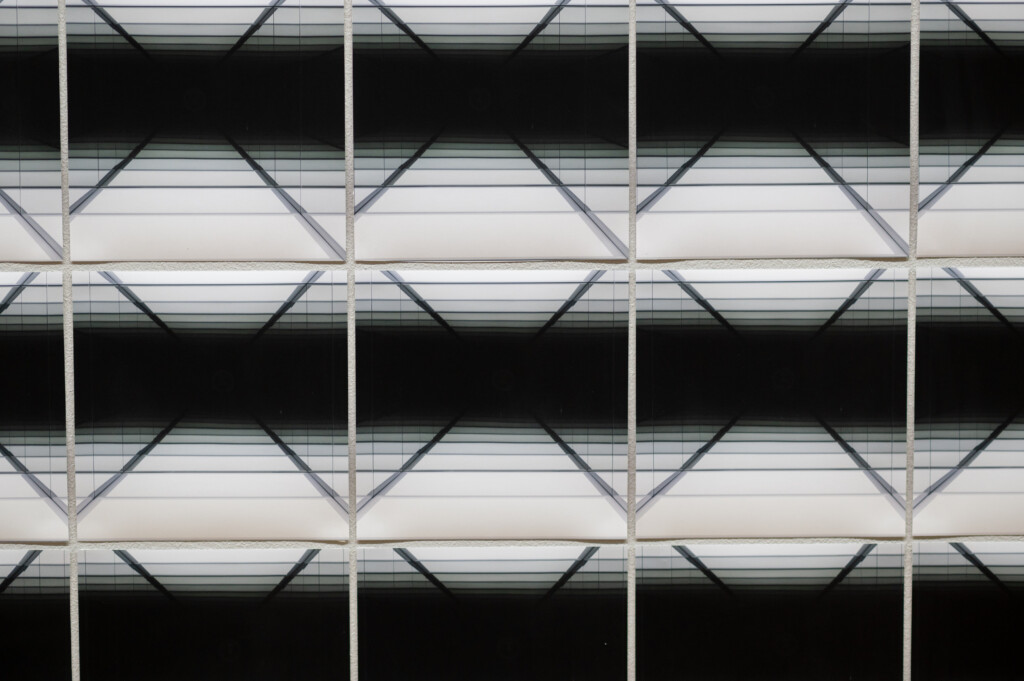 Close up of an artwork, pictures with a slightly changing black and white image aligned close to each other ( Close Up) / Squeezed in Infinity II (Detail view), NAMU_Kyiv, 2023 Nadia Kaabi-Linke