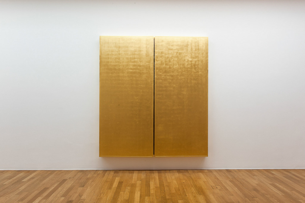 Closed religious triptych coated in gold leaf.