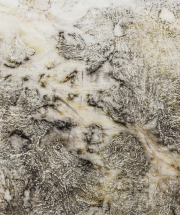 A detail of a painting shows the imprints of heavy weathering traces in black, beige, and yellow inks. Nadia Kaabi-Linke, A Short Story of Salt and Sand.