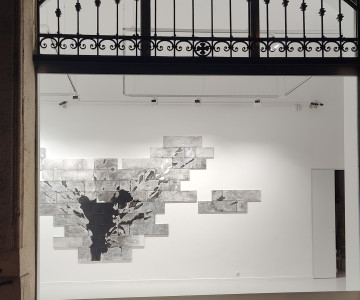 Nadia Kaabi-Linke's painting Phoenix (2025) in the gallery, street view.