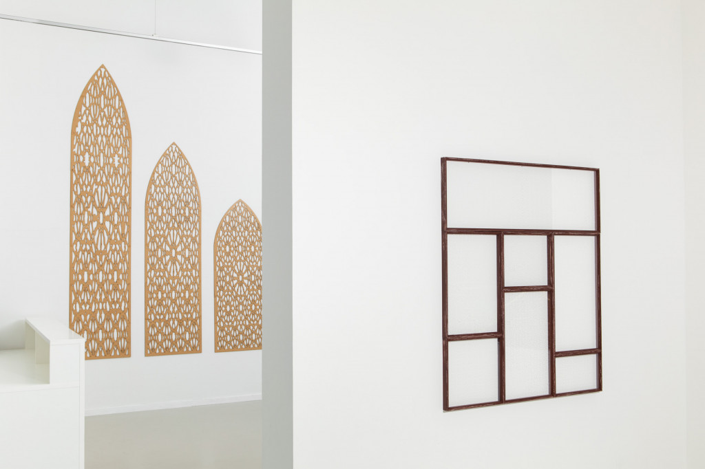 Two wall installations by Nadaia Kaabi-Linke in a contemporary art gallery.