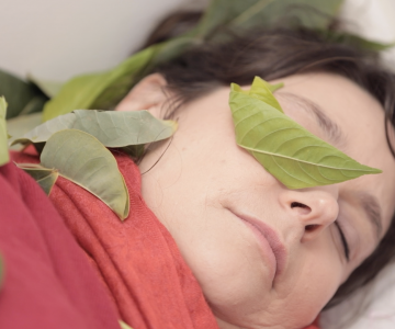 Sleeping woman with leaves in her face. Nadia Kaabi-Linke August 13