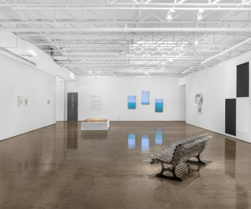 White and bright gallery space with industrial ceiling and various artworks. Nadia Kaabi-Linke We Didn’t Know We’re Ready