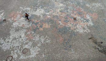View from above on to the Albrecht-Scholz-Platz in Berlin-Neukölln and the permanent public artwork, Meinstein.