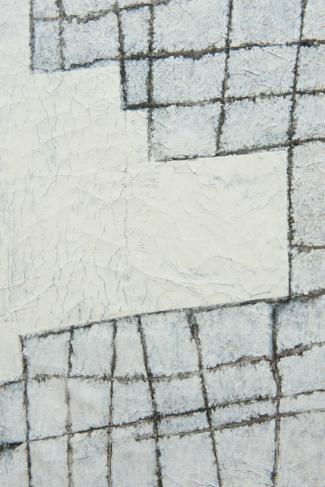 Painting of an irregular, grid-like structure in white and grey hues. Some of the squares are completely covered by white paint.