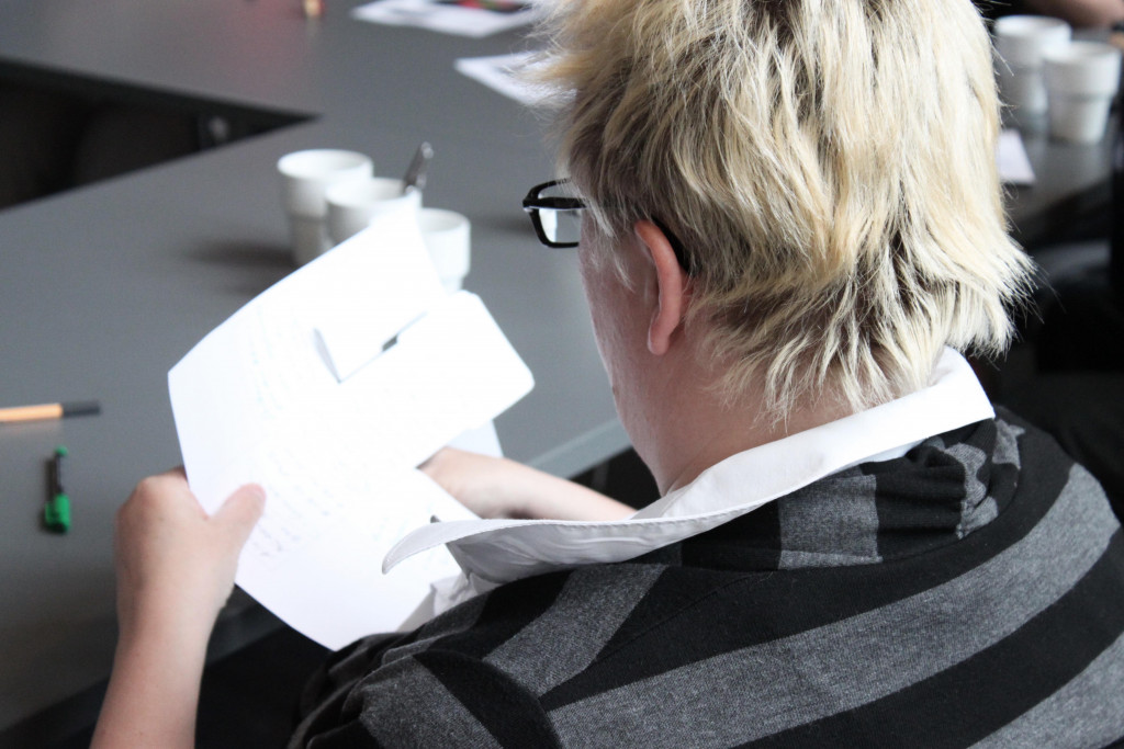 Woman participating in a workshop.